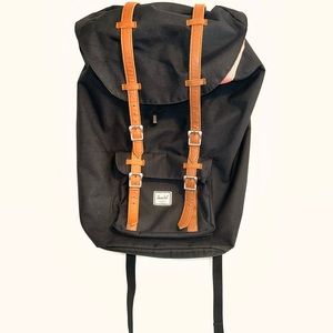 Herschel Supply Company  Black With Red Trimming Backpack. In Great Condition.